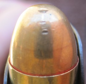 Note the marks on this bullet left by the previous, unextracted cartridge having jammed up against it.